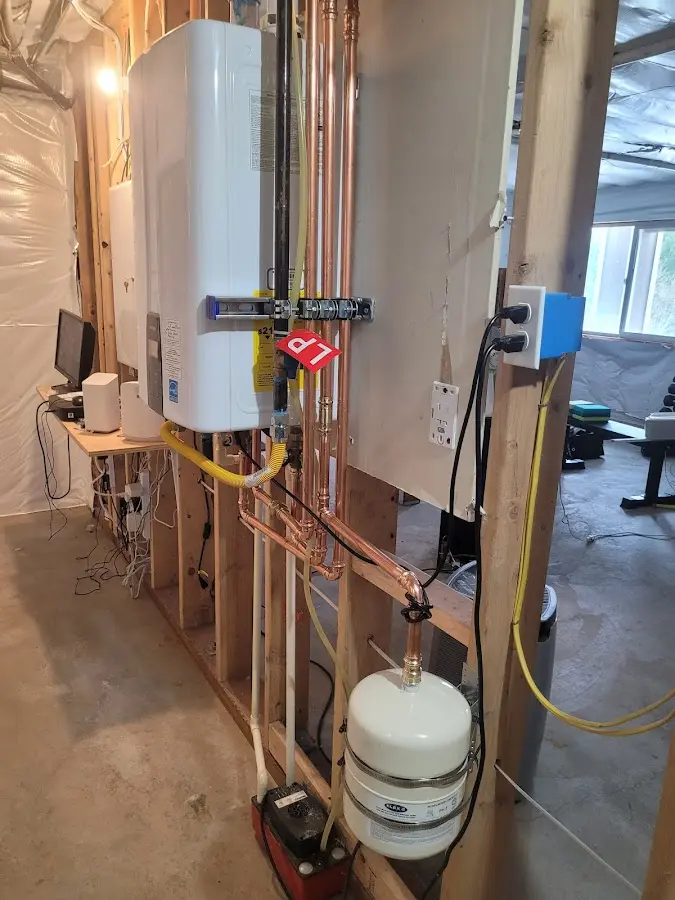 Licensed plumber repairing a kitchen sink in Ham Lake