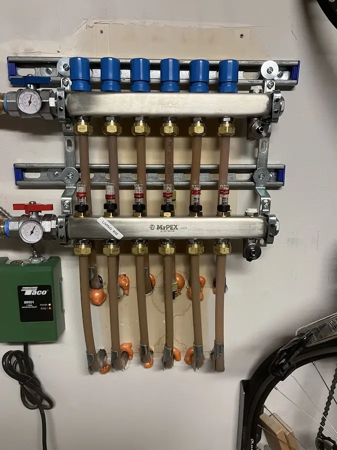 Plumber performing Water Heater Repair at a residential property in Ham Lake